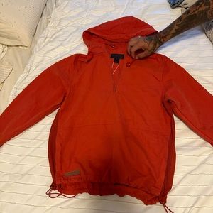 Selling a red windbreaker/coat size (m)